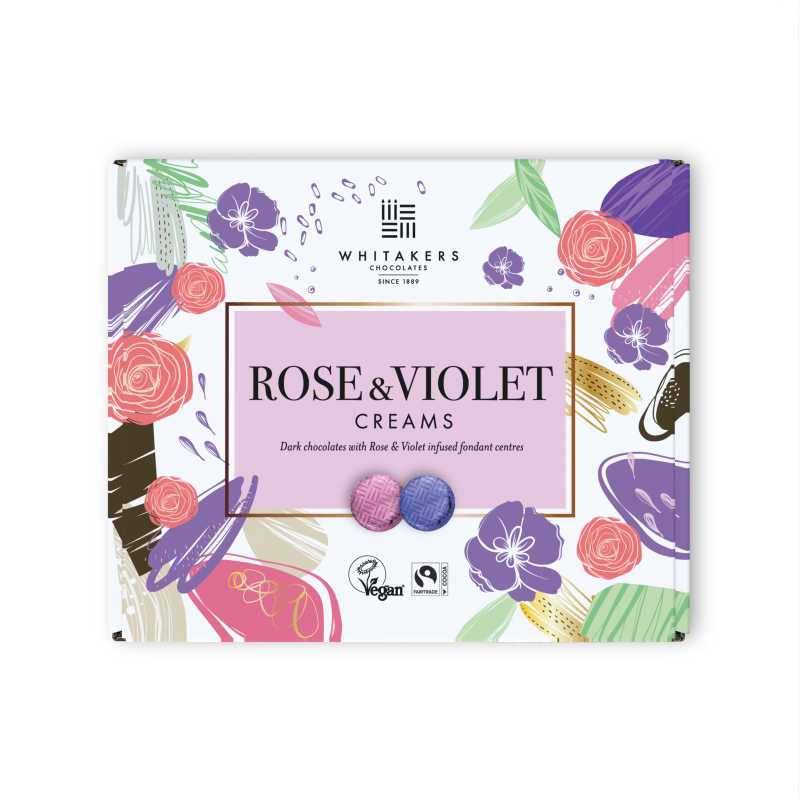 Rose and Violet Selection Box, a romantic fusion of dark chocolate and floral-infused fondant centres. This enchanting collection offers 24 individually foil-wrapped chocolate creams in stunning gift boxes