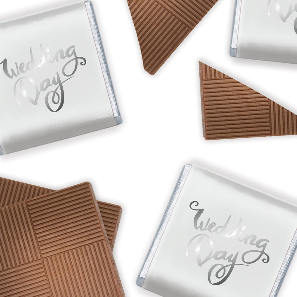 Milk Chocolate Neapolitans, designed to celebrate love and union.  Each chocolate is delicately wrapped in luxurious foil and encased in a pristine white paper wrapper, beautifully adorned with 'wedding day' in graceful silver print.  This bulk 2kg box, containing 400 individually wrapped chocolates
