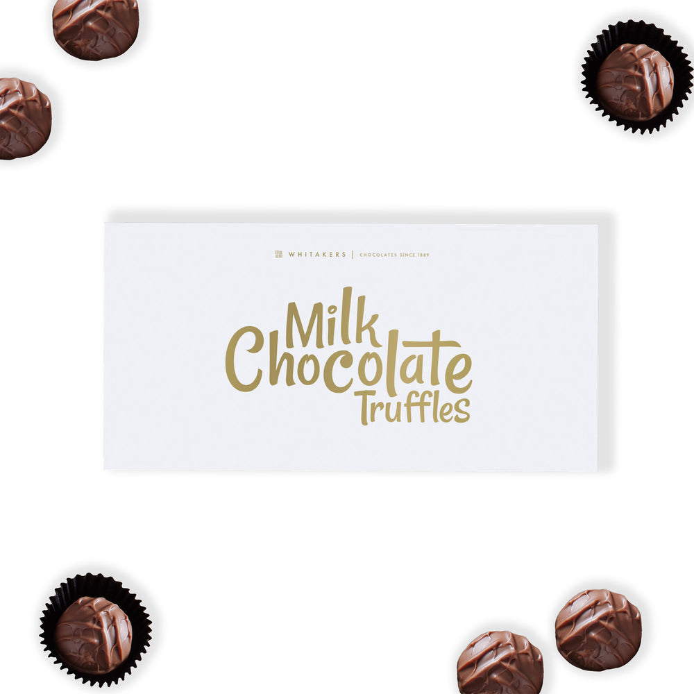 Luxury Milk Chocolate Truffles. This exquisite gift box contains eight hand-finished truffles, each featuring a lusciously soft and creamy milk chocolate ganache centre, lovingly encased in a smooth milk chocolate shell