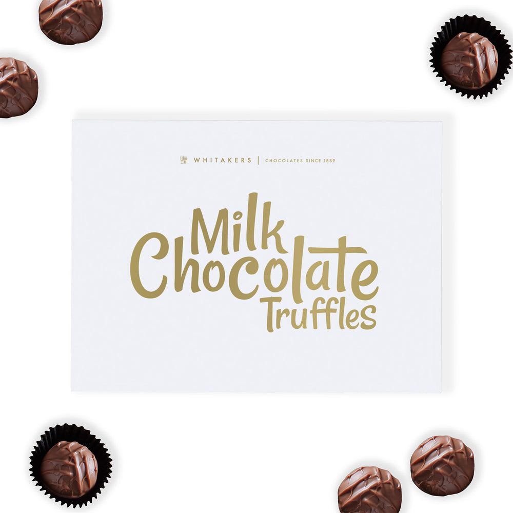 Luxury Milk Chocolate Truffles. This exquisite gift box contains eight hand-finished truffles, each featuring a lusciously soft and creamy milk chocolate ganache centre, lovingly encased in a smooth milk chocolate shell