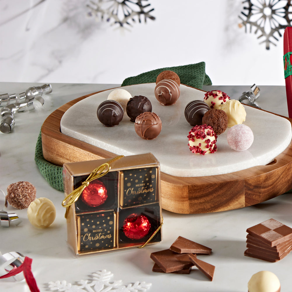 This exquisite gift box contains 10 delicious chocolates, featuring a mix of Merry Christmas Neapolitans and our classic gold-foiled mint crisps, offering a delightful variety of milk and dark chocolates