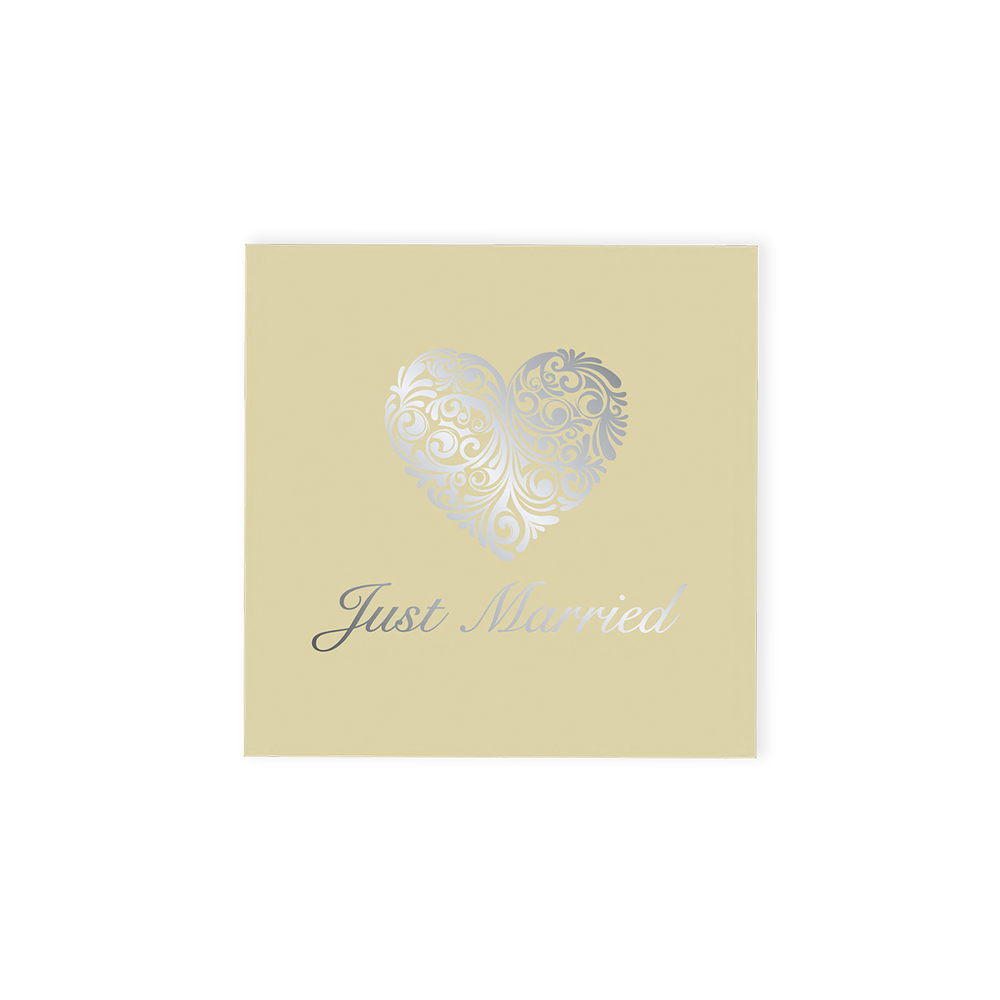 "Just Married" Chocolate Gift Box, an exquisite offering that pairs elegance with indulgence.  This cream-coloured gift box is beautifully adorned with an ornate silver heart and stylish "Just Married" font on the top, making it a standout addition to any wedding celebration.  Inside, discover four delicious hand-finished truffles, an assortment of milk, dark and white chocolates