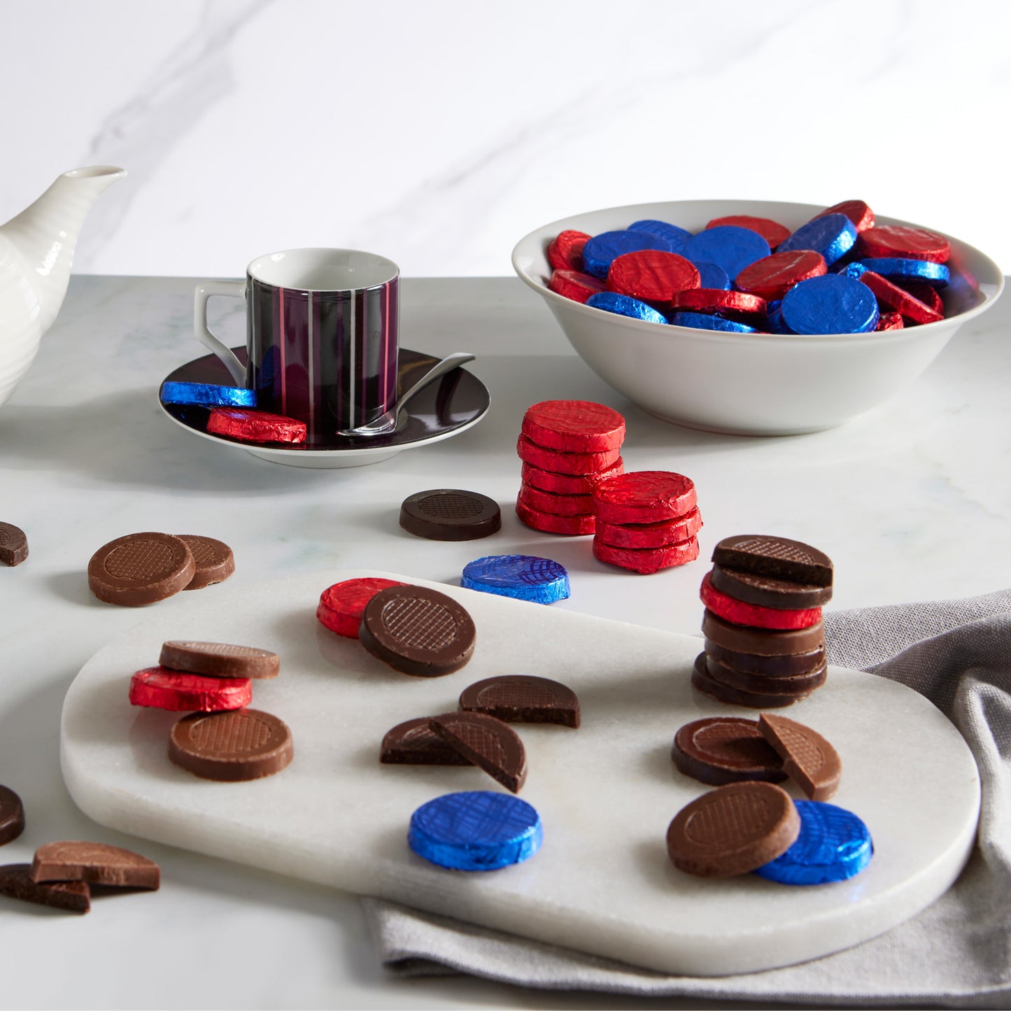 Dark chocolate discs individually wrapped in red foil