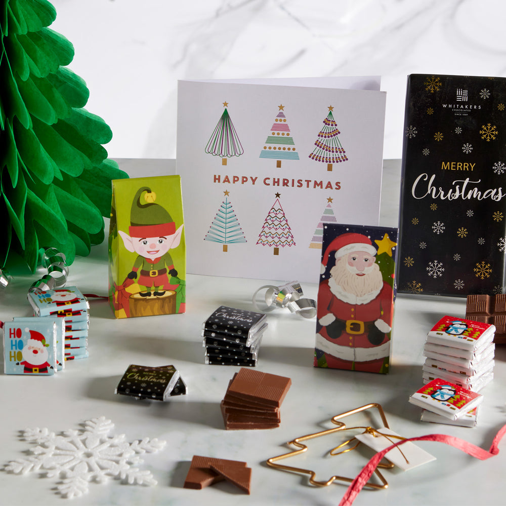 Christmas Fun-themed Milk Chocolate Neapolitans. Each of these 150 smooth and creamy milk chocolates is carefully wrapped in Luxury foil and encased in a vibrant, full-colour paper wrapper, featuring playful Christmas motifs that capture the joy and excitement of the holiday. Packed in a bulk 750g tub