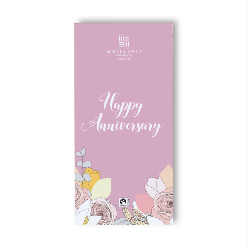 our 'Happy Anniversary' Milk Chocolate Bar. This exquisite 90g bar comes wrapped in a beautifully designed wrapper, adorned with romantic and celebratory motifs that perfectly encapsulate the spirit of an Anniversary