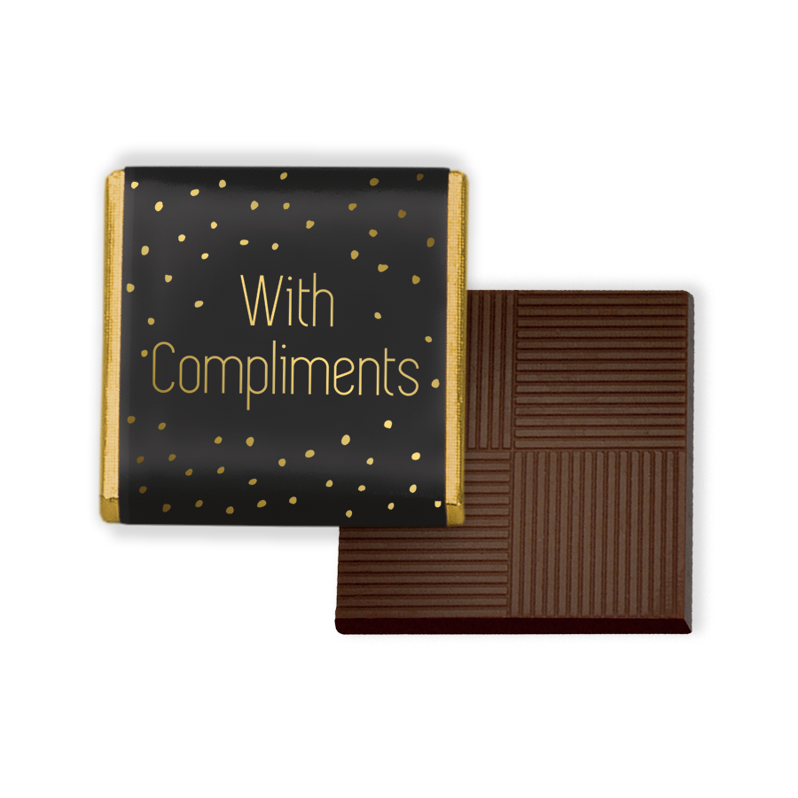 Dark Chocolate Neapolitan squares, each individually wrapped in a luxurious combination of foil and paper. Presented in a sleek black wrapper adorned with 'with compliments' in exquisite gold print